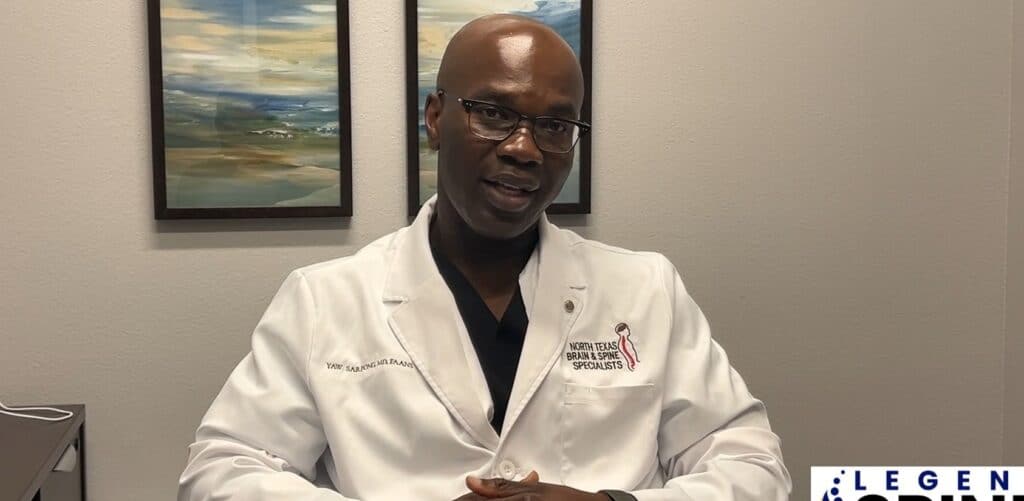 Doctor in white coat discussing medical topic.