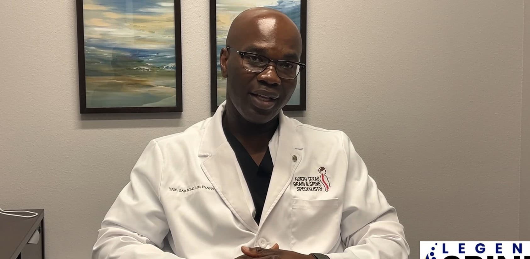 Doctor in white coat discussing medical topic.
